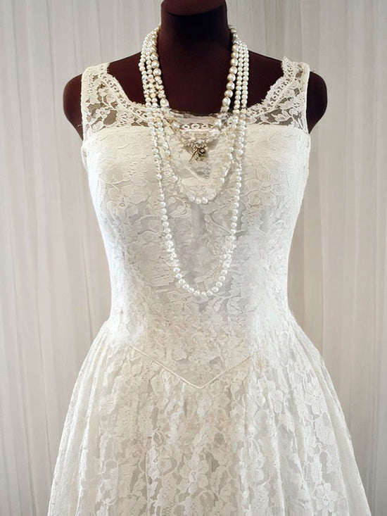 A-line Illusion Lace Tea-length Wedding Dresses