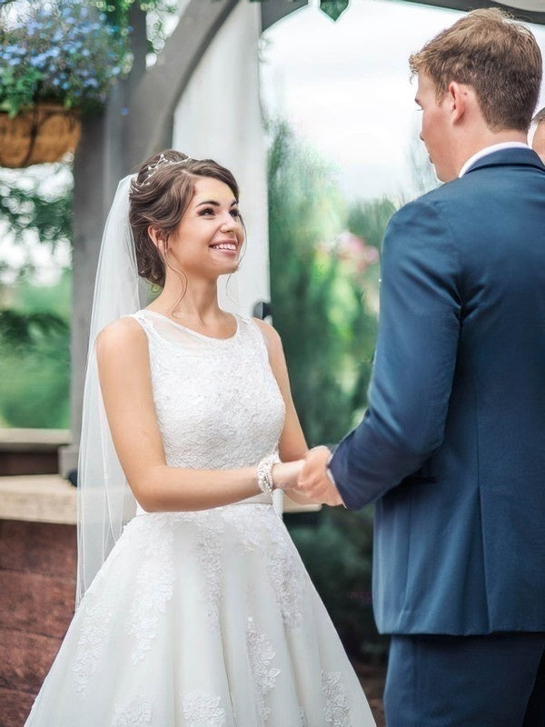 A-line Illusion Tulle Wedding Dress With Appliques Lace