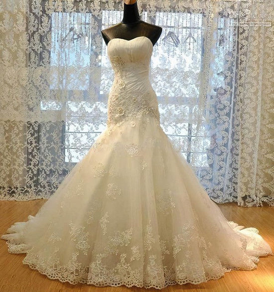 Tulle Sweetheart Trumpet/Mermaid Wedding Dress With Appliques Lace