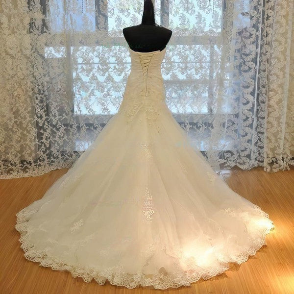 Tulle Sweetheart Trumpet/Mermaid Wedding Dress With Appliques Lace