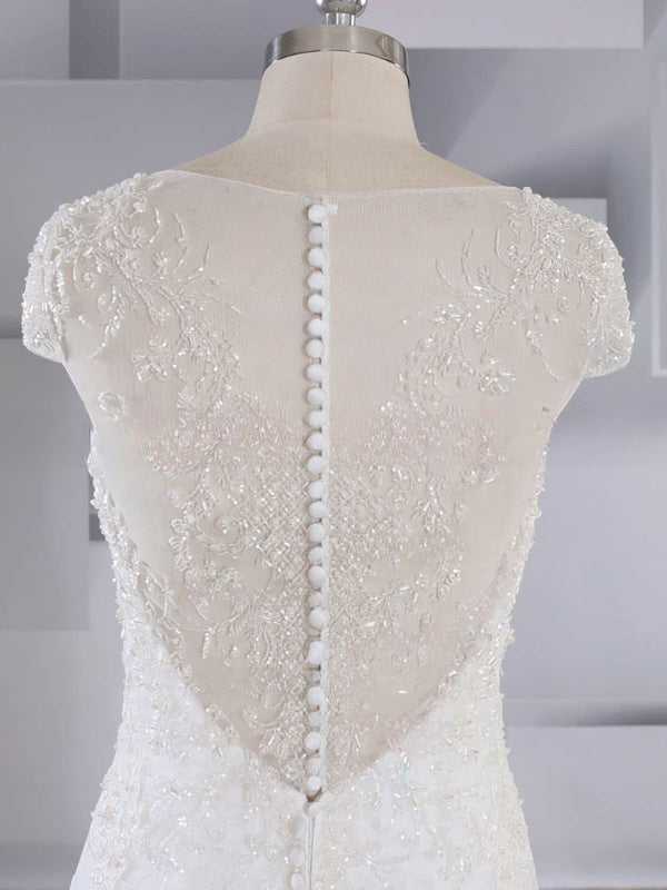 Elegant Trumpet/Mermaid V-neck Tulle Sweep Train Wedding Dress With Beading